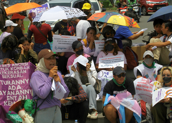 When will eliminating domestic violence become a priority for the Indonesian government? image